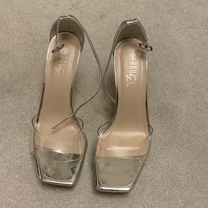 Silver high heel shoes